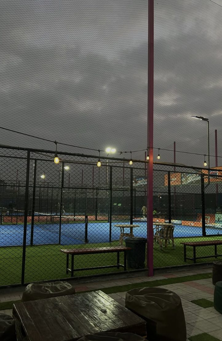 Courtside seating beside the padel courts